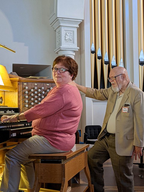 Charlene Cranmer at organ with Dr. Jerry Davidson